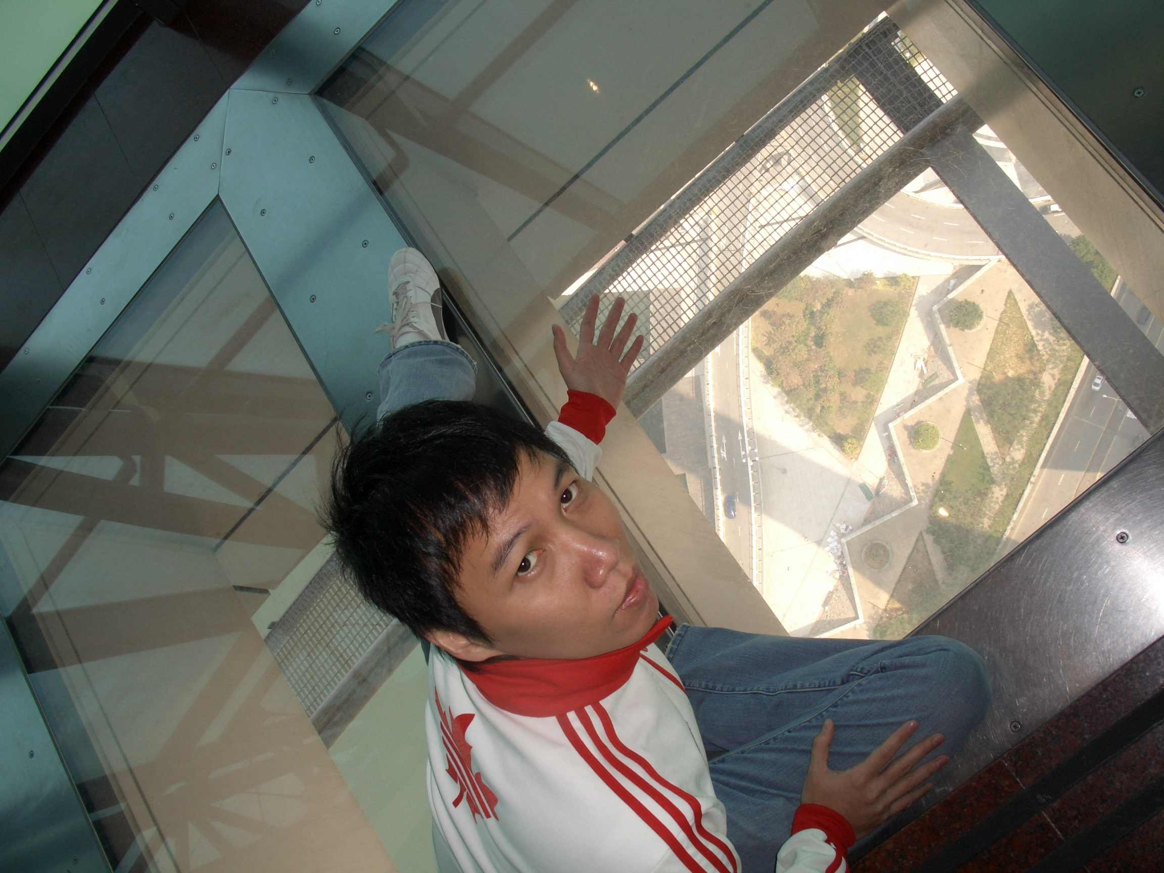myself on the macau tower glass floor